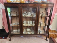 Large antique wooden and glass China cabinet