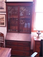 Antique two-piece mahogany secretary desk with two