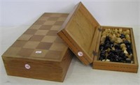 (2) Chess sets in folding wood game board cases.