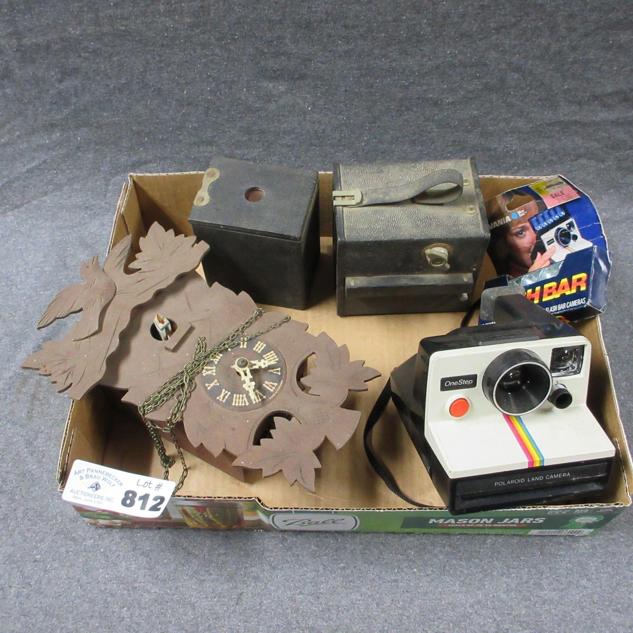Polaroid Camera, Cockoo Clock & Other Camera's