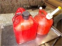 2 Gal. & 1 1/4 Gal. Poly Gas Cans / 1 With Fuel