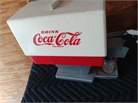 Vtg Drink Coca-Cola dispenser holds a bottle