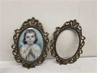 Little girl praying oval picture frames