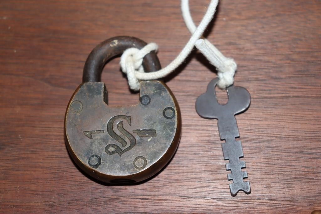 Antique Slaymaker padlock with key and a padlock