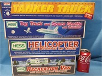 3 Hess Toy Trucks 2998,1999,2001 years and a