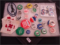 Container of mostly political pinbacks including