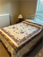 lavender and cream colored quilt