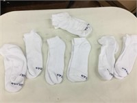 Seven pair of Gilden socks appear large