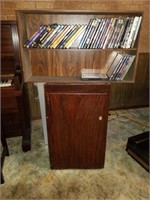 OLD WOOD CANINET AND SHELF OF DVD'S