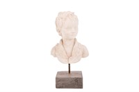 CARVED PLASTER BUST OF A BOY