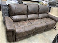 Leather style reclining sofa MSRP $1799 addyson