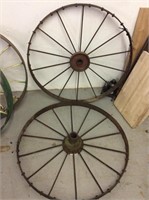 pair of antique steel wheels approximately 35