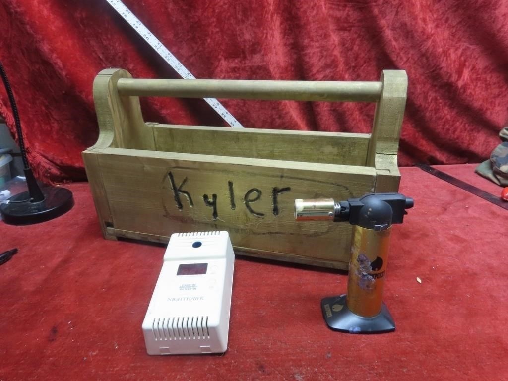 Wood tool tote, hedge trimmer, sprayer wand,