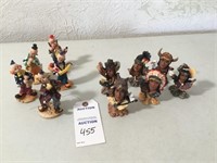 5 clown figurines; 6 indian figurines