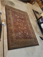 AREA RUG 91 BY 63 INCHES