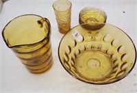 Amber glass grouping  7 pieces