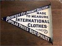 Vintage Porcelain International Clothes Sign