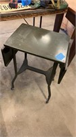 Metal rolling table 18”w ( no sides up) x14”x