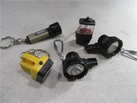 (5) FlashLIght Themed Collectible Keychains