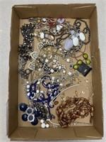 Costume jewelry, mostly necklaces