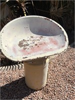 Antique Tractor Seat Mounted on Dairy Milk Can