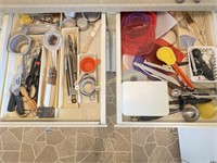 Two drawers of assorted kitchen utensils