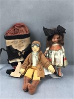 Three small old dolls
