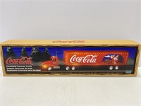 Vintage Coca-Cola Christmas caravan truck