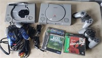 Two Sony Playstation,  Four Controllers, Cables