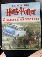Harry Potter Book paired with two wands (Pink and