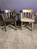 A pair of wooden office chairs...f1