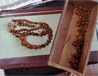 Large lot of unique old orange / black beads