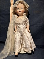 Old Composite Doll on stand
