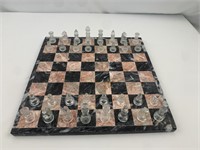 Marble chessboard with glass pieces