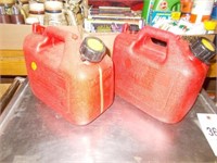 (2) 1 Gal. Poly Gas Cans / 1 With Fuel