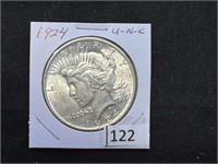 (1) 1924 Peace Dollar unc.