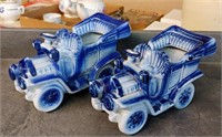 2 BLUE DECORATED POTTERY CAR PLANTERS