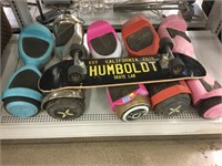 Assorted hoverboards and a skateboard