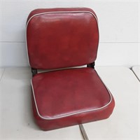 Another folding cushioned seat, this time in red