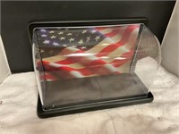 Plastic storage case with flag background