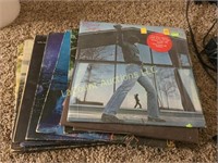 assorted record albums Billy Joel more