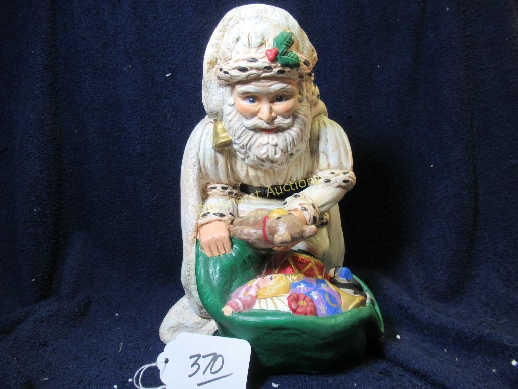 HANDCRAFTED CERAMIC SANTA HOLDING A TEDDY BEAR W/