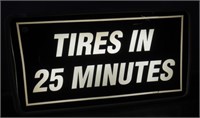Tires in 25 Minutes Light Up Sign. Measures: