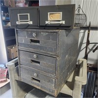 Two vintage metal file cabinets