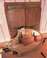 Figural shield wall mount mirror and Oak dresser