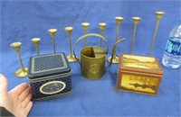 2 tins - 9 brass candles & watering pitcher