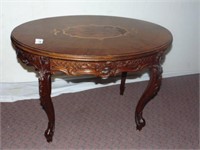 Walnut inlay top oval table with carved legs 27" W