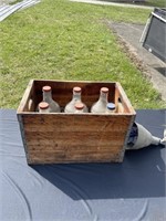 Wooden crate with old bottles