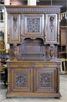 Henri II Style Figural Bust Carved Walnut Buffet.