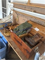 TOP OF BENCH--WOOD TRUNK W/ MED RAIN SUIT,